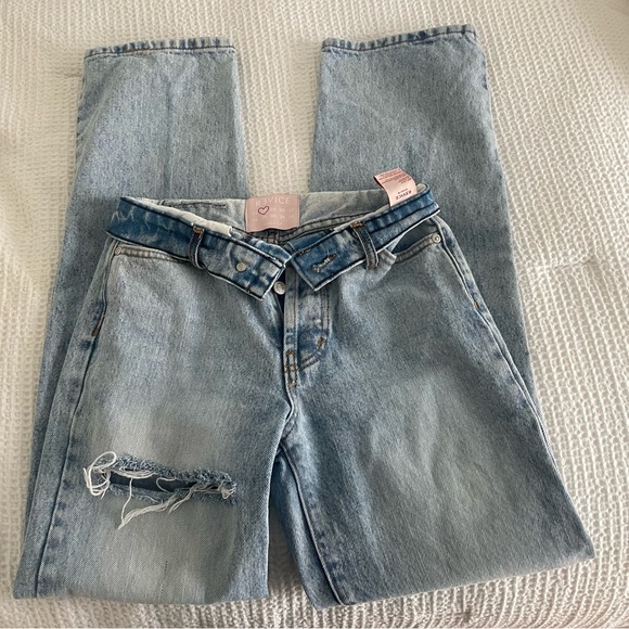 Revice denim Foldover waistband. Distressing in thigh and knee. - Picture 1 of 4